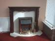 MAHOGANY FIRE PLACE, white marble background, white marble....